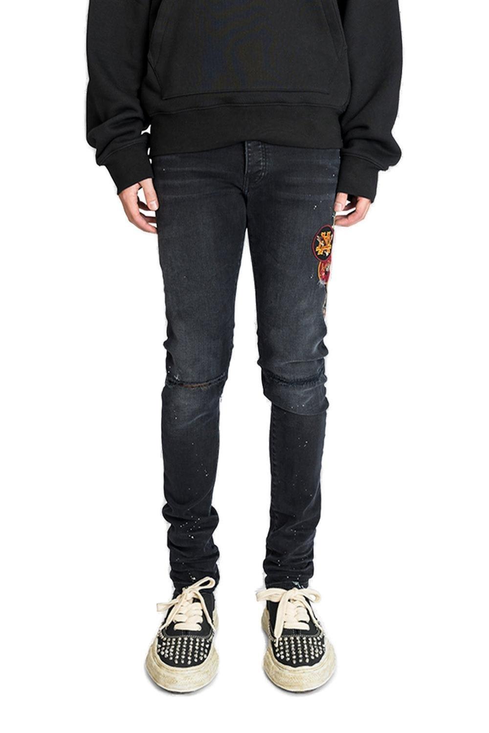 AMIRI Logo贴布做旧紧身牛仔裤