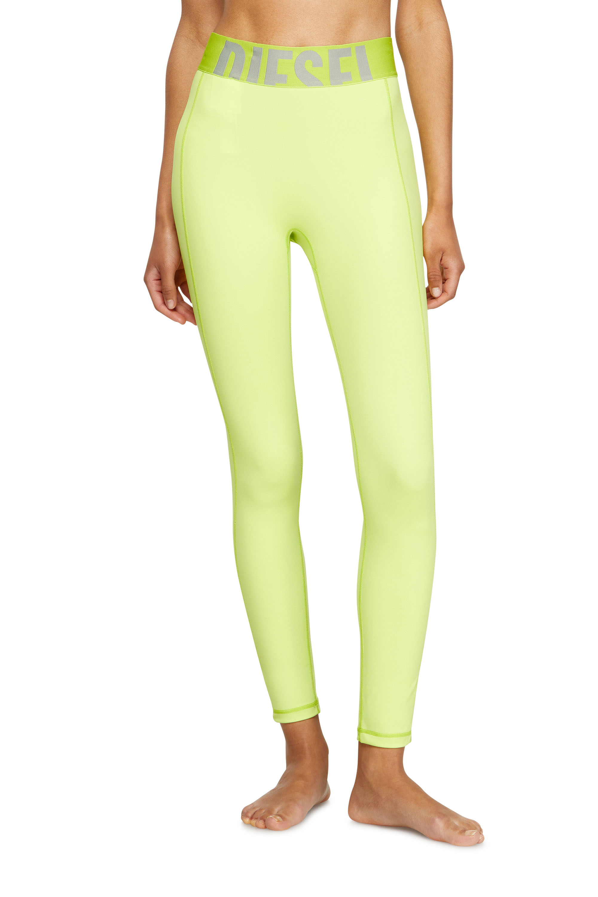 Diesel - Microfibre leggings with cut-off logo - Pants - Woman - Green