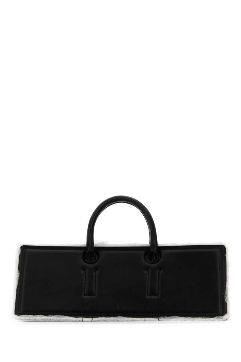 Dentro Handbags.