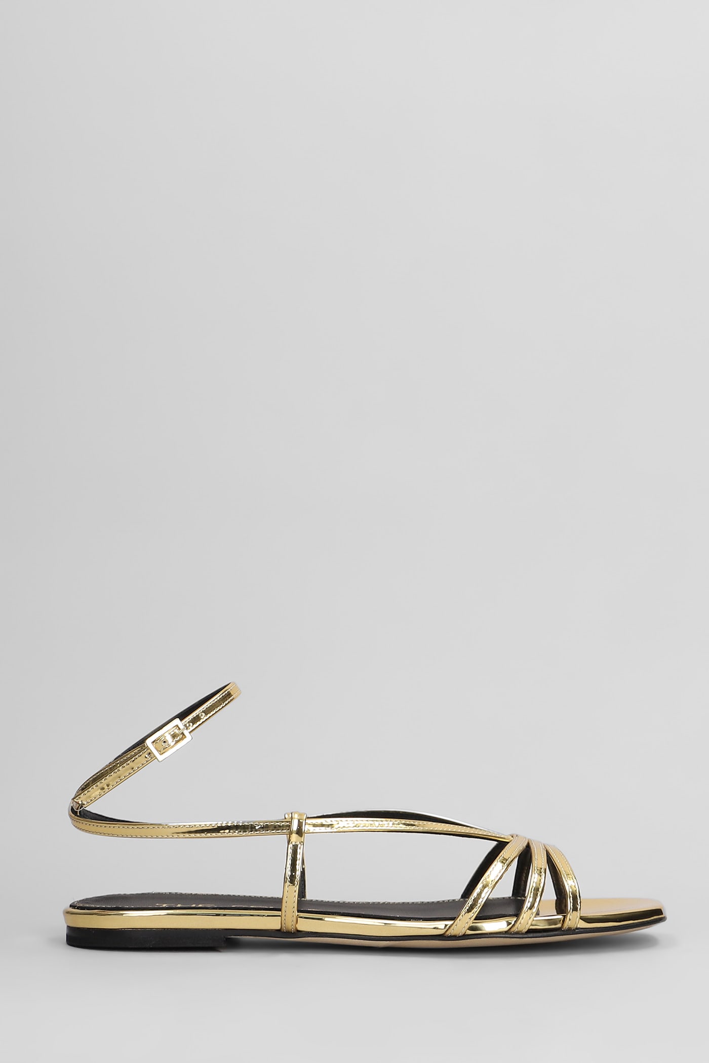 The Seller Flats In Gold Leather