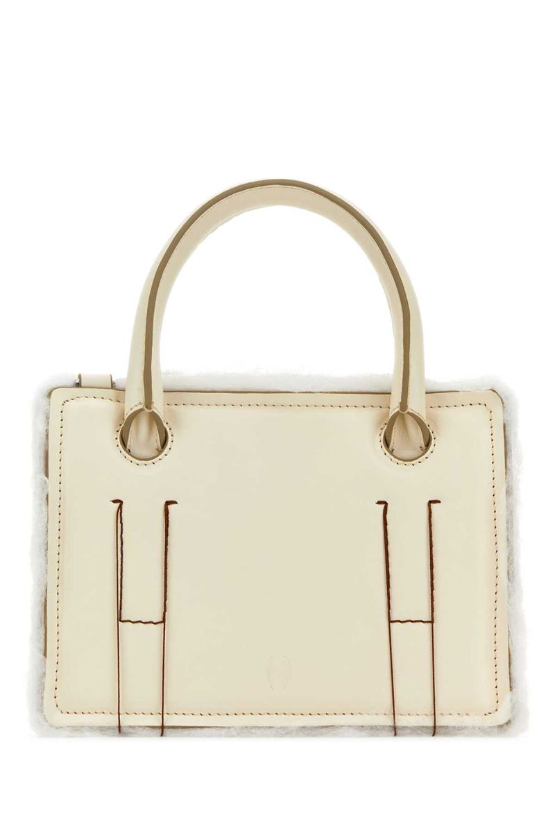 Dentro Handbags.
