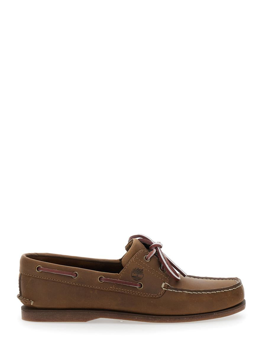 Brown Boat Loafers With Lace-Up Detail In Leather Man
