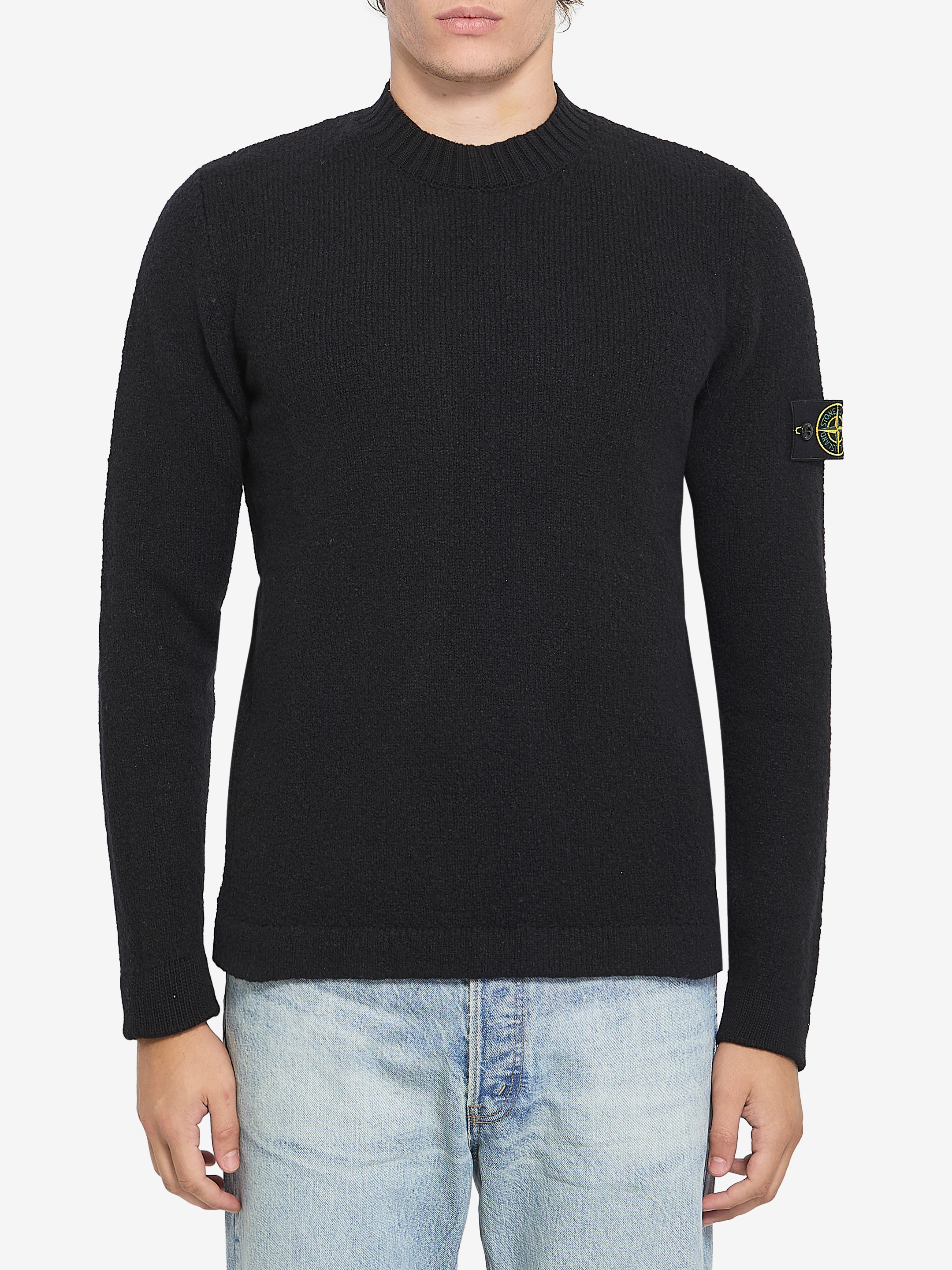 Crew neck sweater with brushed texture.