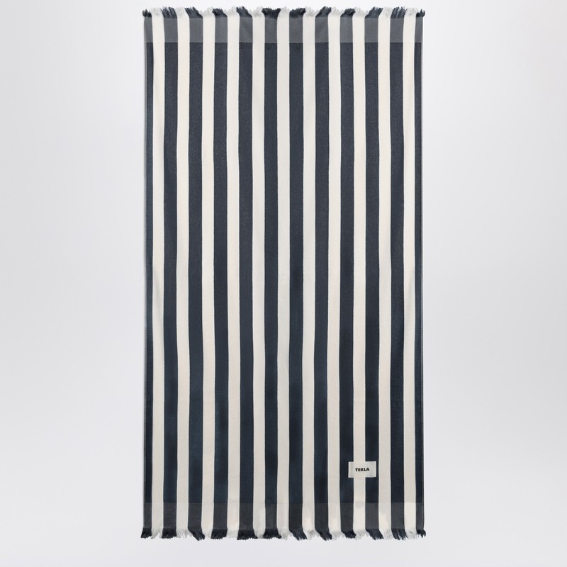 White and blue striped beach towel