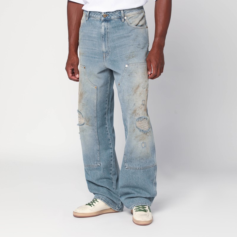 Light blue jeans with sand wash distressed effect