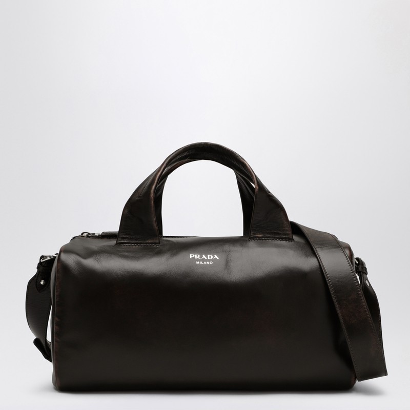 Small brown leather travel bag