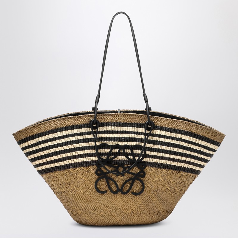Large Anagram basket bag in iraca palm and leather