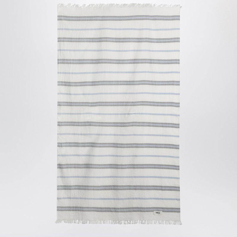 White beach towel with striped pattern